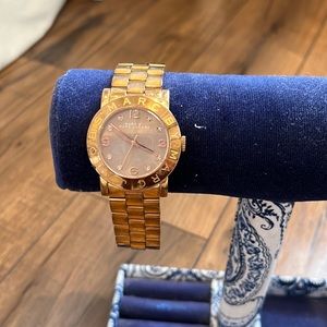 MARC JACOBS rose gold watch.